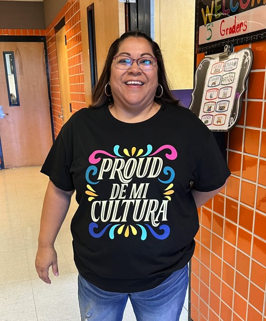 Mrs. Harper wearing a Hispanic Heritage Month T-shirt. 